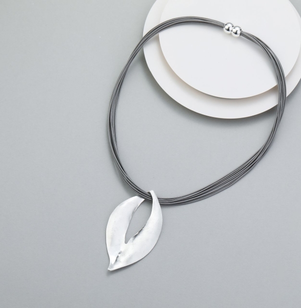 cutout-teardrop-pendant-on-corded-magnetic-necklace-silver