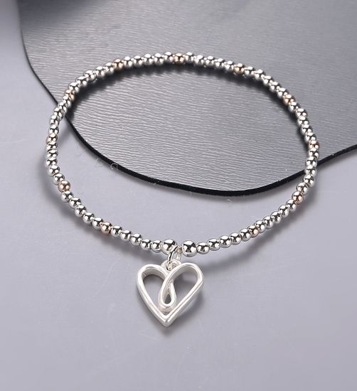 twisted-heart-pendant-on-stretchy-bracelet-silver-rosegold