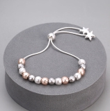 Mixed Toned Balls On Pull-Cord Bracelet With Star Ends 