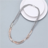 Multi-Tiered Curved Discs On Corded Magnetic Necklace